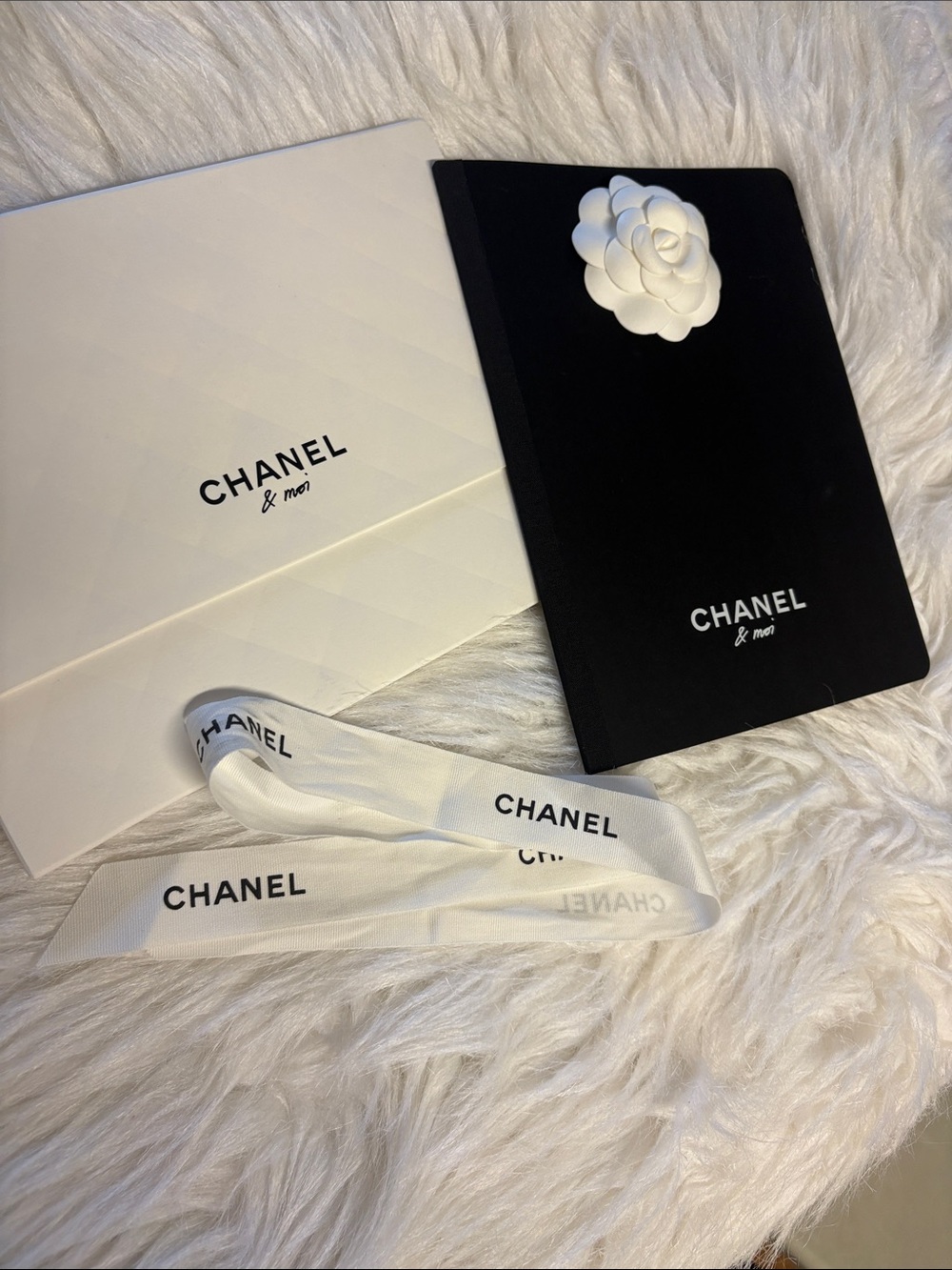 CHANEL Black Notebook with White Camellia & Chanel Ribbon